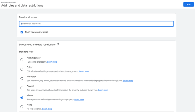 GA4 Add roles and data restrictions screen with the Viewer role selected among Administrator, Editor, Marketer, Analyst, Viewer, and None